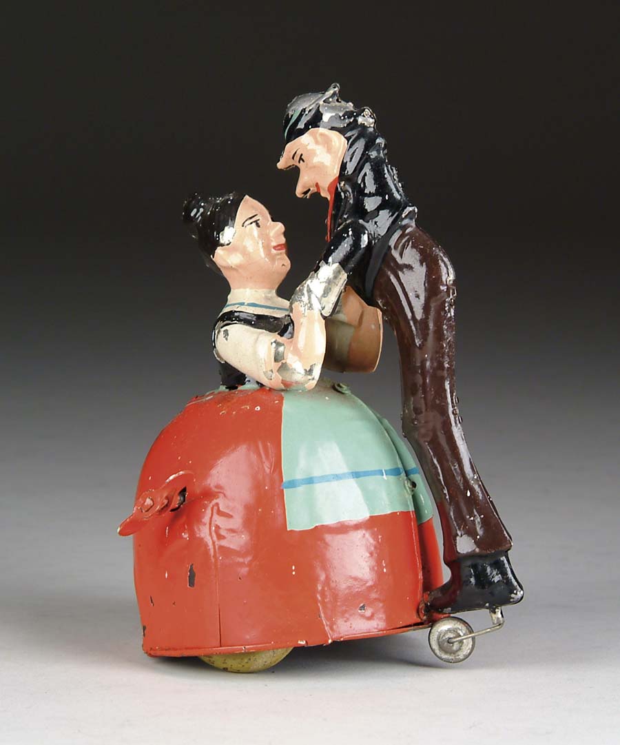 Appraisal: JACK SPRAT WIFE DANCING WIND UP TOY German hand-painted tin