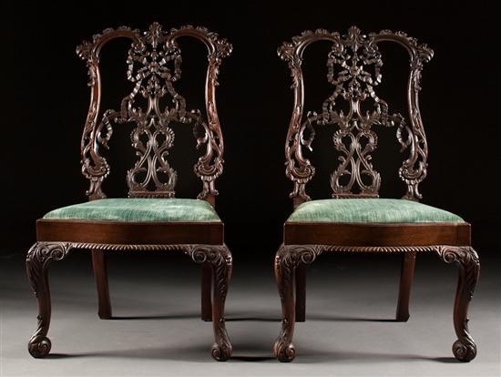 Appraisal: Pair of Irish Chippendale style carved mahogany ribbon-back side chairs