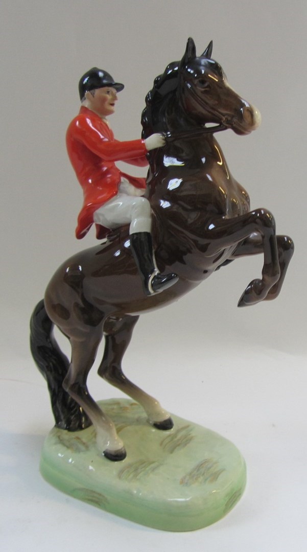 Appraisal: A Beswick huntsman on horseback brown gloss model No Impressed