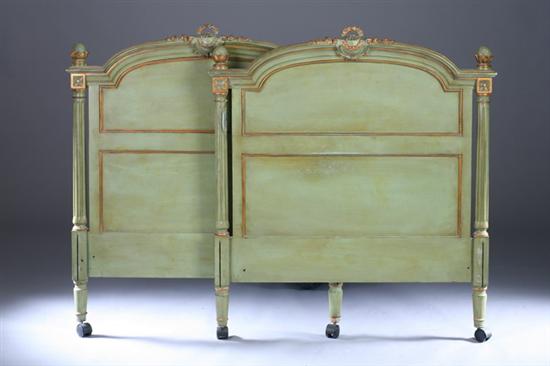 Appraisal: LOUIS XVI STYLE PAINTED AND PARCEL-GILT TWIN BED FRAME early