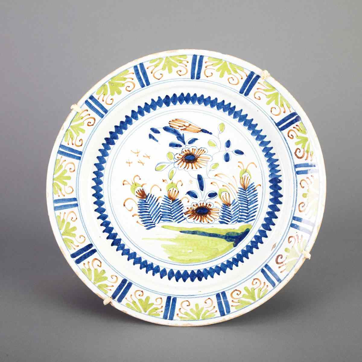 Appraisal: Delft Polychrome Charger th century diameter cm diameter