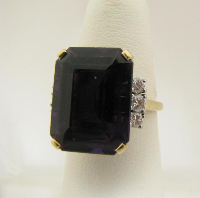 Appraisal: Tiffany Co k yellow gold and platinum emerald cut amethyst