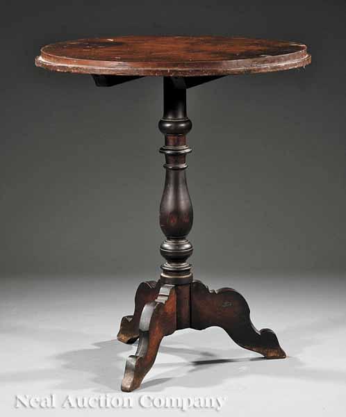 Appraisal: An American Walnut Tilt-Top Table mid- th c the circular