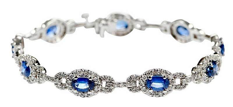 Appraisal: kt Sapphire Diamond Bracelet nine oval cut blue sapphires estimated