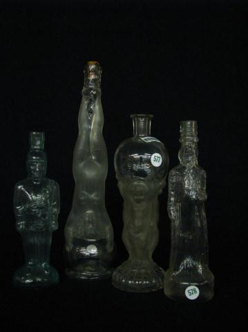 Appraisal: Group of four antique figural bottles including soldier in aqua