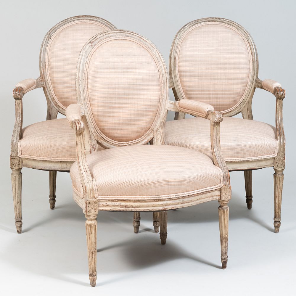 Appraisal: Assembled Set of Three Louis XVI Painted Fauteuils en Cabriolet