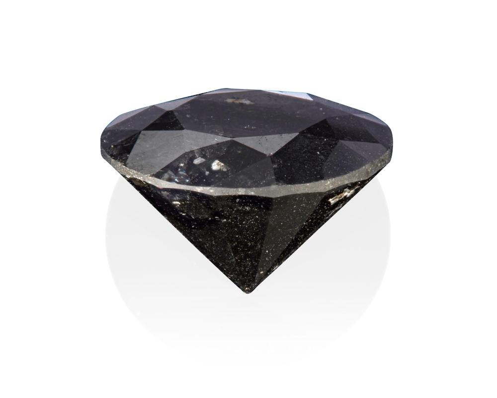 Appraisal: AN UNMOUNTED BLACK DIAMONDAn unmounted black diamond A round full-cut