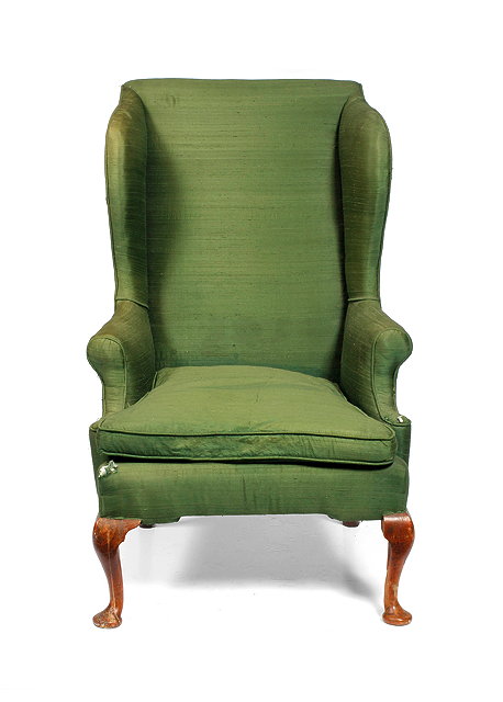 Appraisal: A GEORGE III WING BACK ARMCHAIR with green silk upholstery