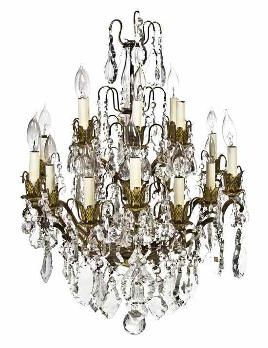 Appraisal: A Continental Gilt Metal and Glass Eighteen-Light Chandelier having a