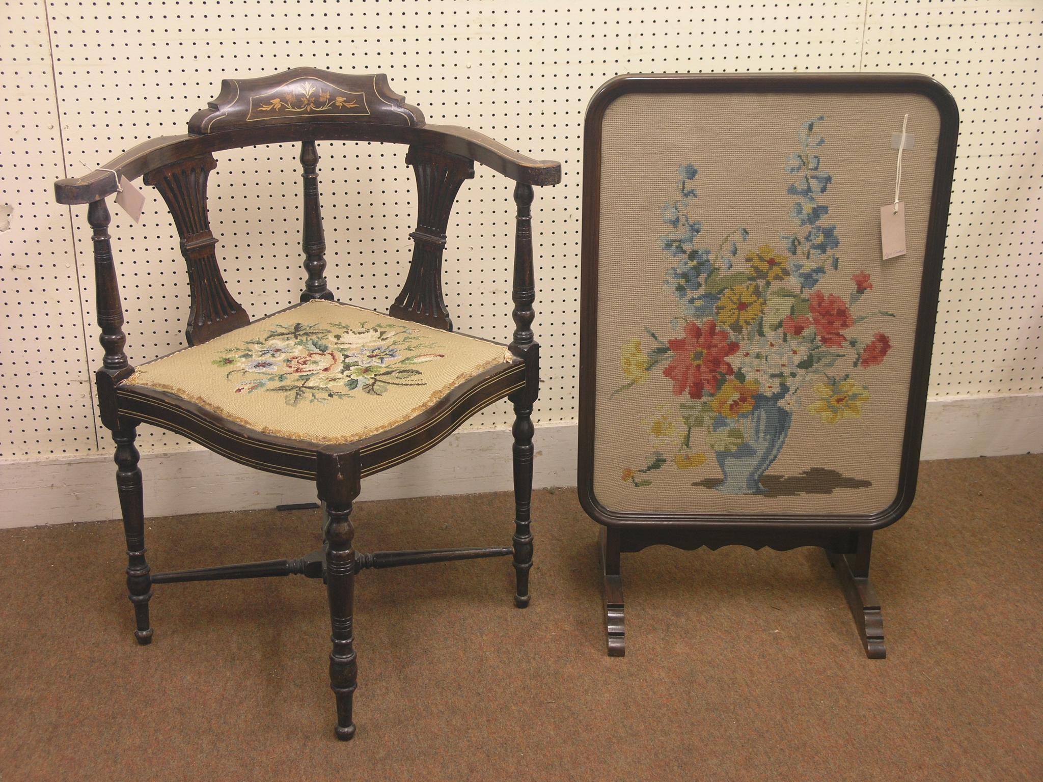 Appraisal: An Edwardian inlaid mahogany corner-fitting elbow chair with needlework seat