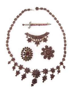 Appraisal: Gilt Bohemian Garnet necklace in bibb style with garnet flower