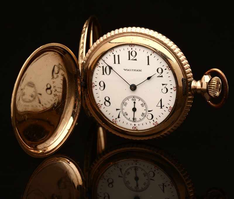 Appraisal: A Waltham K gold pocket watch The white porcelain dial