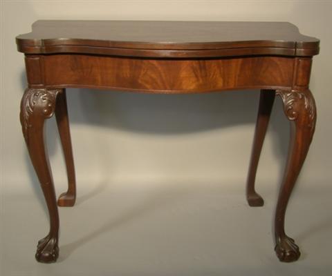 Appraisal: CHIPPENDALE STYLE MAHOGANY CARD TABLE Shaped top raised on cabriole