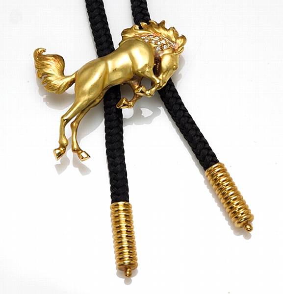 Appraisal: A diamond k gold and cord horse motif bolo tie