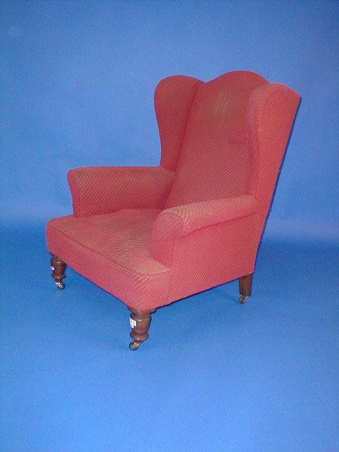 Appraisal: A Victorian upholstered wing armchair