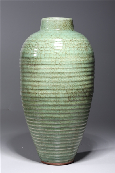 Appraisal: Chinese celadon crackle glazed porcelain vase with ribbed design to