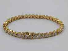 Appraisal: A yellow metal tests ct gold diamond line bracelet set