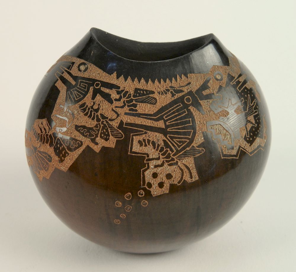 Appraisal: Forrest Naranjo carved ceramic vase Forrest Naranjo carved ceramic vase