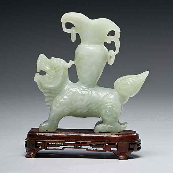 Appraisal: Chinese Qilin Vessel Chinese a carved bowenite qilin figure with