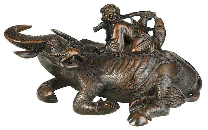 Appraisal: Bronze Figure Riding Water Buffalo Japanese th century fishing figure