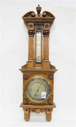 Appraisal: AN OAK CASED WALL BAROMETER THERMOMETER J Hicks London late