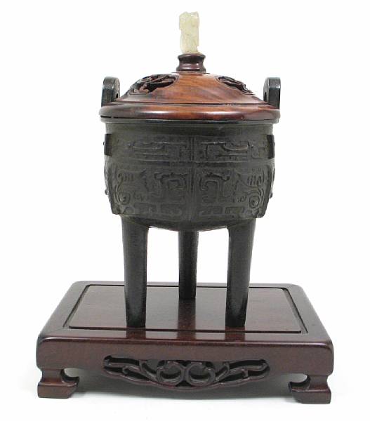 Appraisal: A Chinese bronze tripod censer height in diameter in