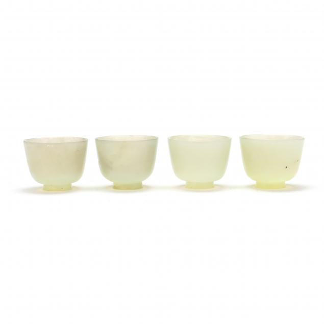 Appraisal: A SET OF FOUR CELADON HARDSTONE CUPS th century light