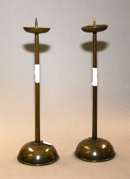 Appraisal: A pair of Japanese bronze candlesticks Wear height in