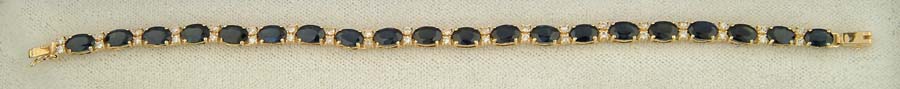 Appraisal: BLUE SAPPHIRE DIAMOND AND K YELLOW GOLD TENNIS BRACELET Twenty