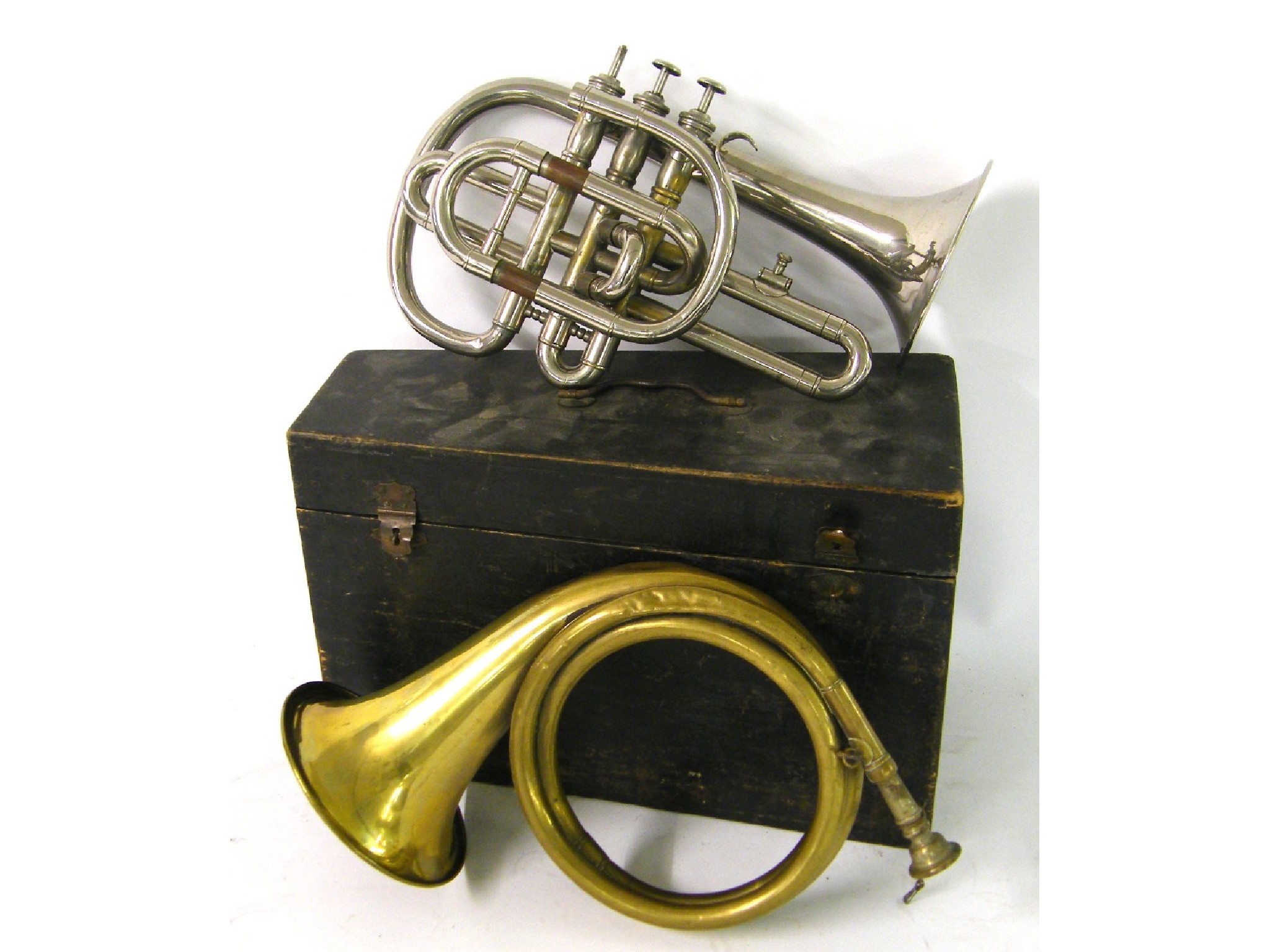 Appraisal: Silver plated Stolzel valve cornet with various attachments within a