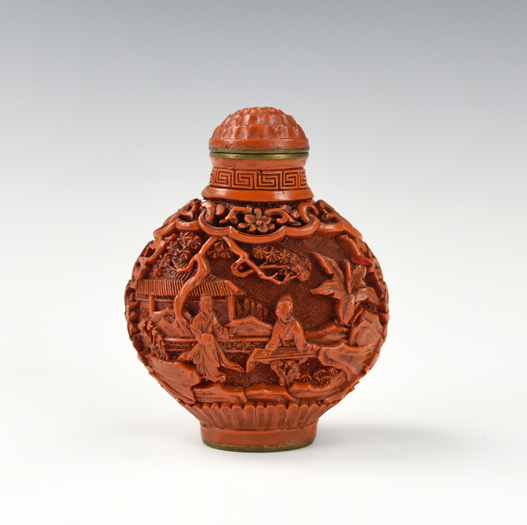 Appraisal: CHINESE CARVED CINNABAR SNUFF BOTTLE TH C of compressed globular