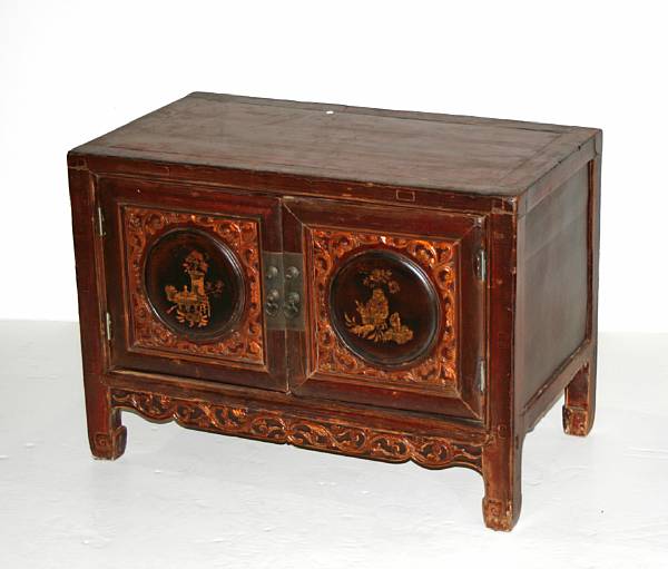 Appraisal: A Chinese solfwood double-door chest