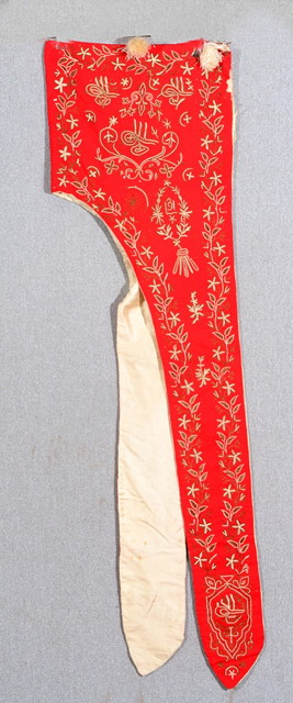 Appraisal: A TURKISH RED GROUND HOOD OR STOLE with gold and