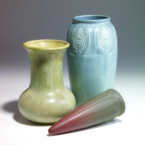 Appraisal: ROOKWOOD CLIFTON Three pieces Two Rookwood Production vessels a bullet-shaped