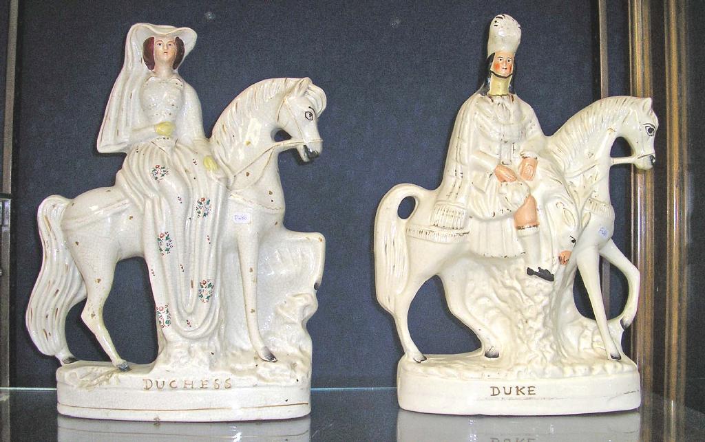 Appraisal: A pair of Staffordshire figures on horseback entitled The Duke