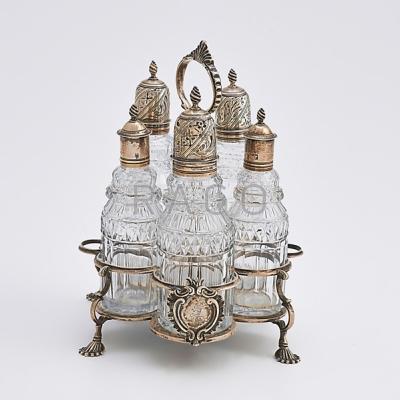 Appraisal: GEORGE III SILVER CRUET SET LONDON Cruet stand supports five