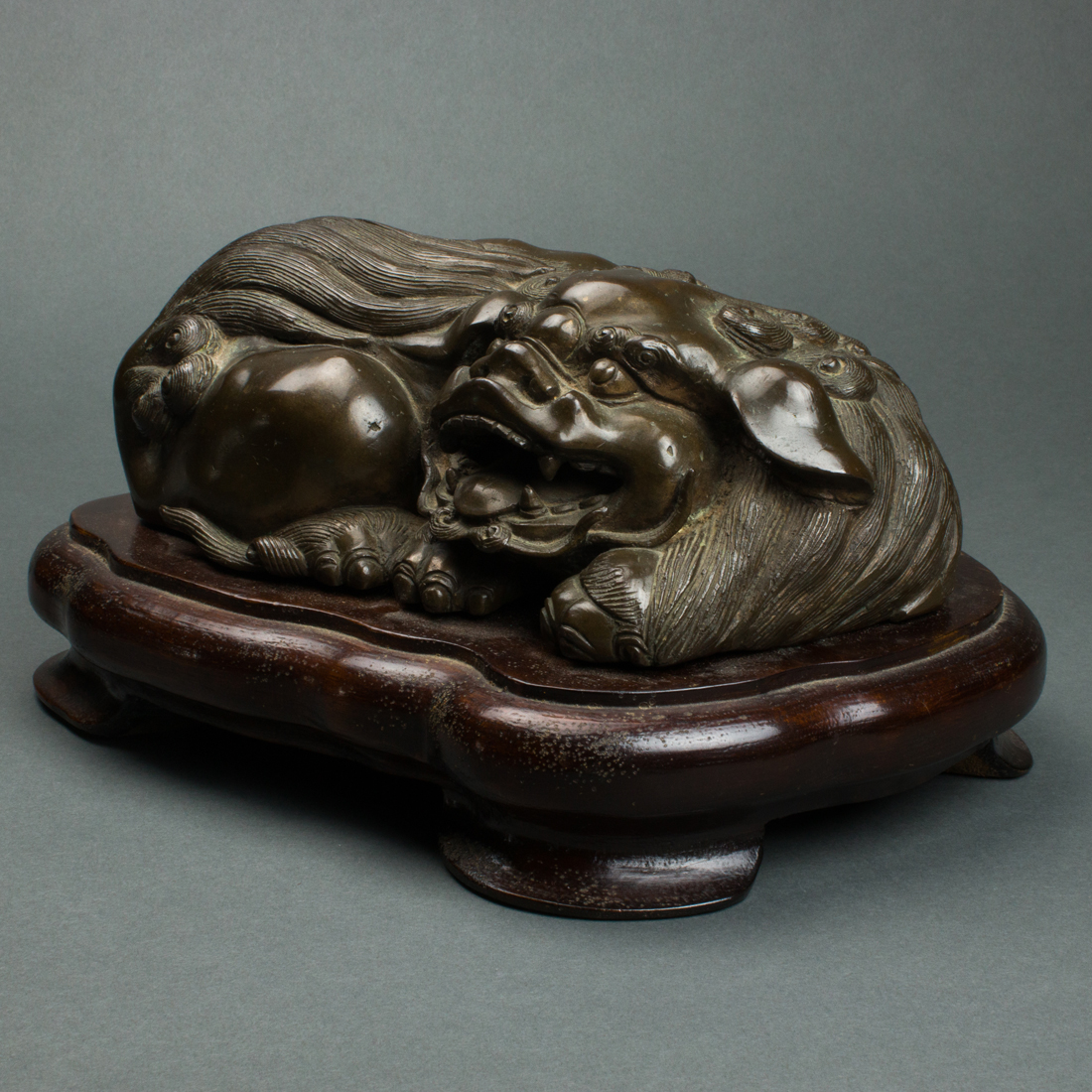 Appraisal: JAPANESE BRONZE FU LION Japanese bronze fu lion with fitted