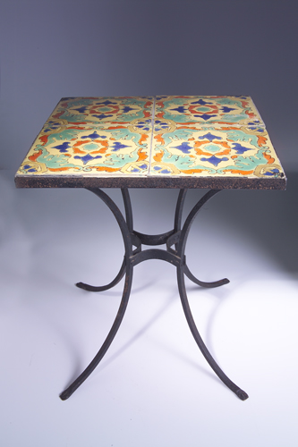 Appraisal: CALIFORNIA Tile-top table with four tiles decorated in a Hispano-Mooresque