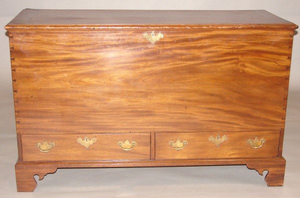 Appraisal: Mahogany dovetailed case lift lid two drawer base bracket feet