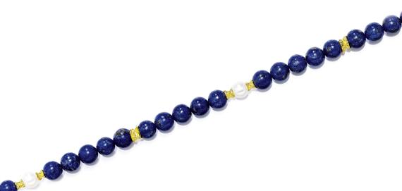 Appraisal: A LAPIS LAZULI AND PEARL SAUTOIR GILBERT ALBERT Gilded silver