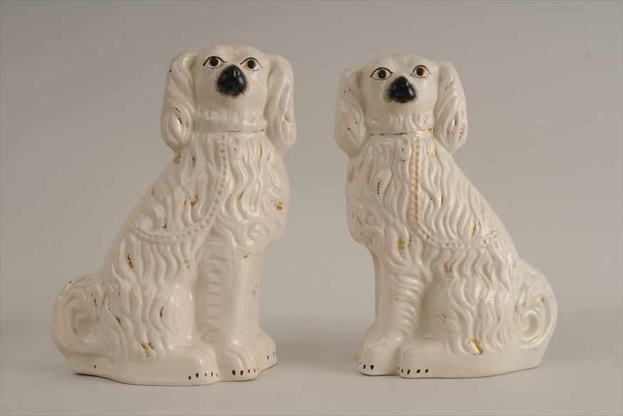 Appraisal: PAIR OF STAFFORDSHIRE GLAZED POTTERY SPANIELS x in