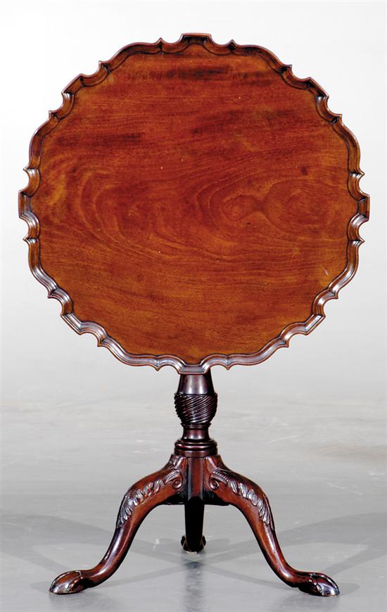 Appraisal: Georgian mahogany tilt-top table circa scalloped and dished top over