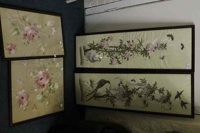 Appraisal: A PAIR OF EMBROIDERED ON SILK PANELS in the Chinese