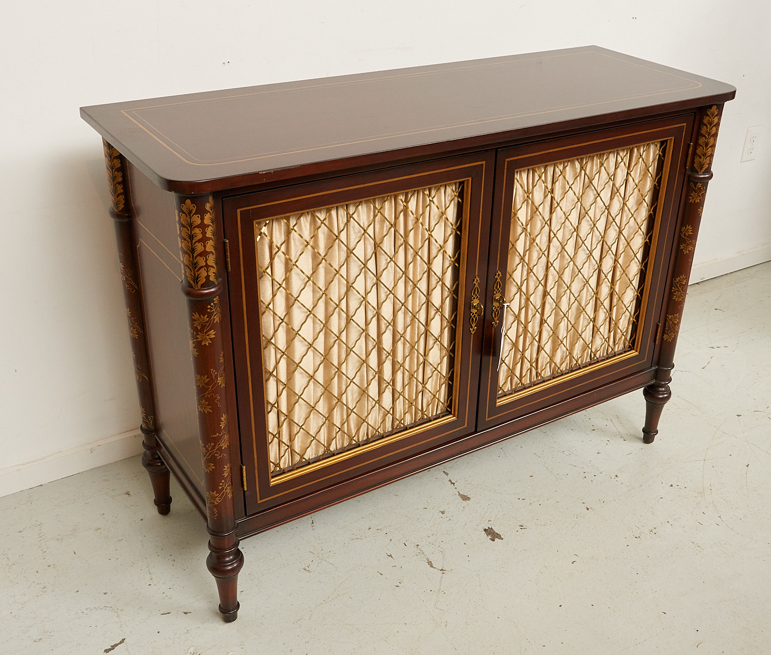 Appraisal: REGENCY STYLE GOLD-STENCILED SIDE CABINET th c with draped chicken