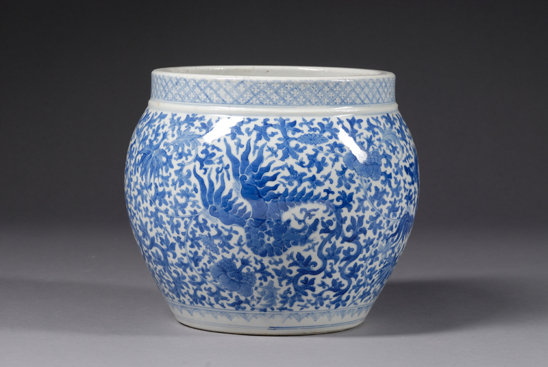 Appraisal: Blue and White Jardiniere China th century foliate dragons on