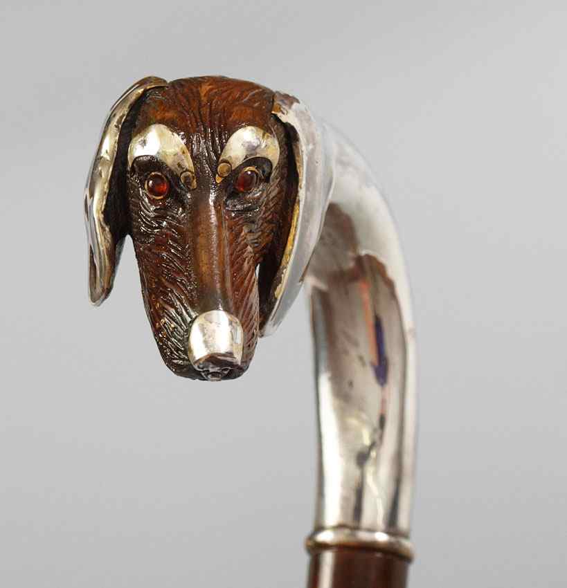 Appraisal: SILVER MOUNTED CARVED DOG HEAD WALKING STICK Carved dog head