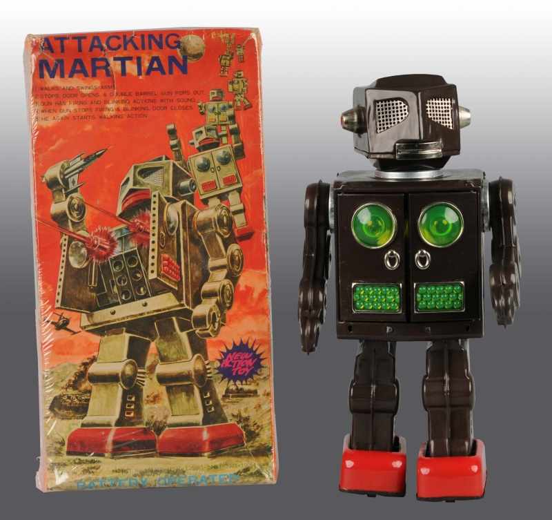 Appraisal: Tin Attacking Martian Battery-Operated Toy Description Japanese Working When in