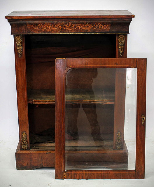 Appraisal: A LATE VICTORIAN WALNUT AND INLAID PIER CABINET with single