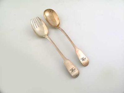 Appraisal: A George III large fiddle pattern serving spoon and matching