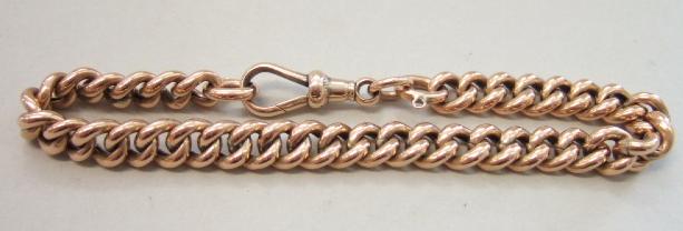 Appraisal: A gold curb link bracelet on a swivel clasp